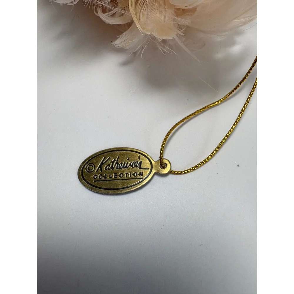 Katherine's Collection Cream Curly Feather Bird Christmas Ornament with Logo Tag